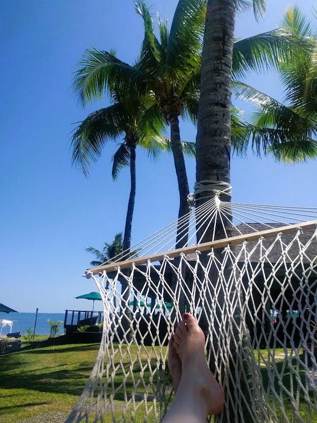 Lounging in a hammock at the Hilton Fiji