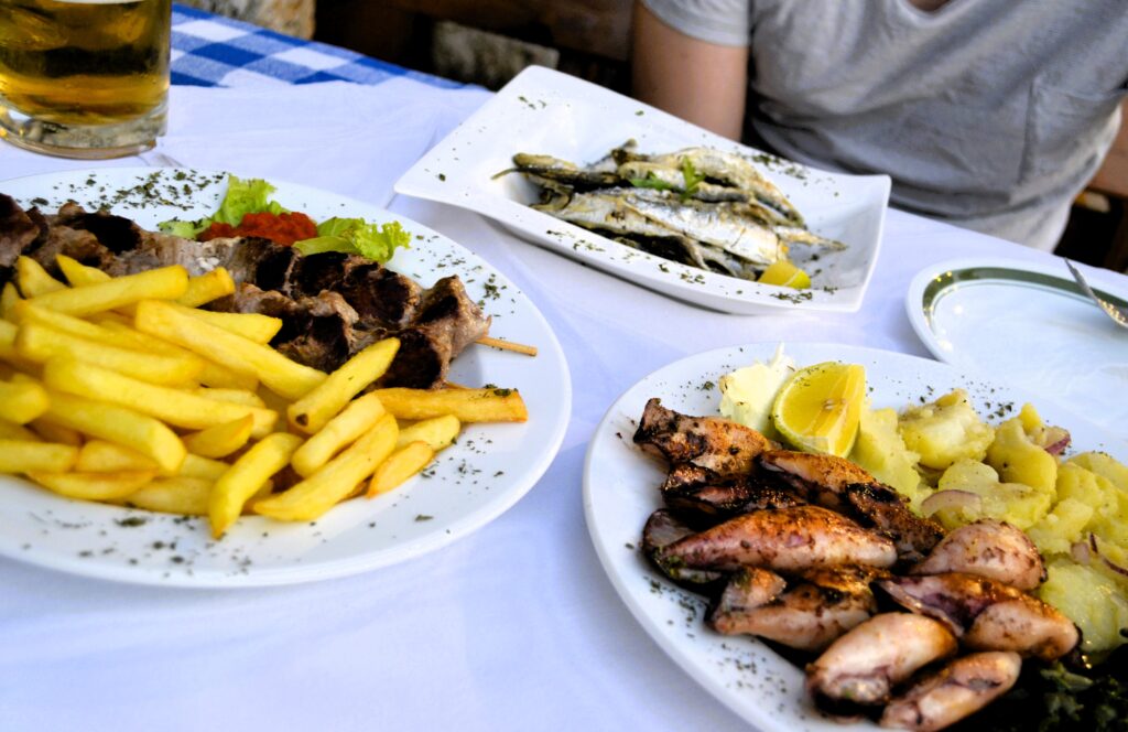 a typical Croatian dinner of seafood & grilled meats