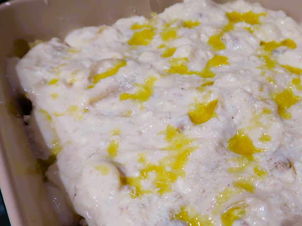 bechamel topping on the pasta shells before baking