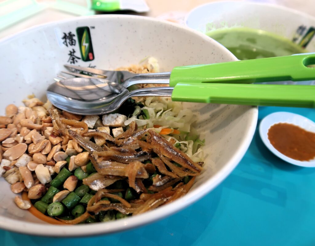 Thunder tea rice, a unique dish to try at a hawker center in Singapore