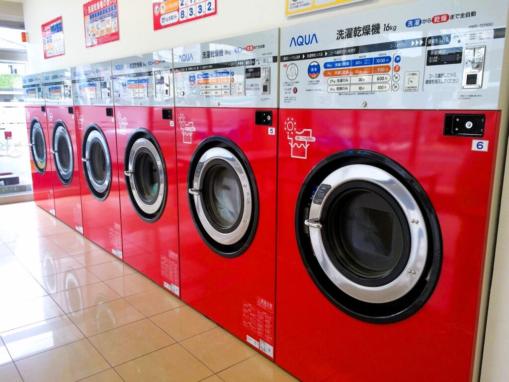 Using coin laundries is a very good way to save money when travelling with singapore with kids