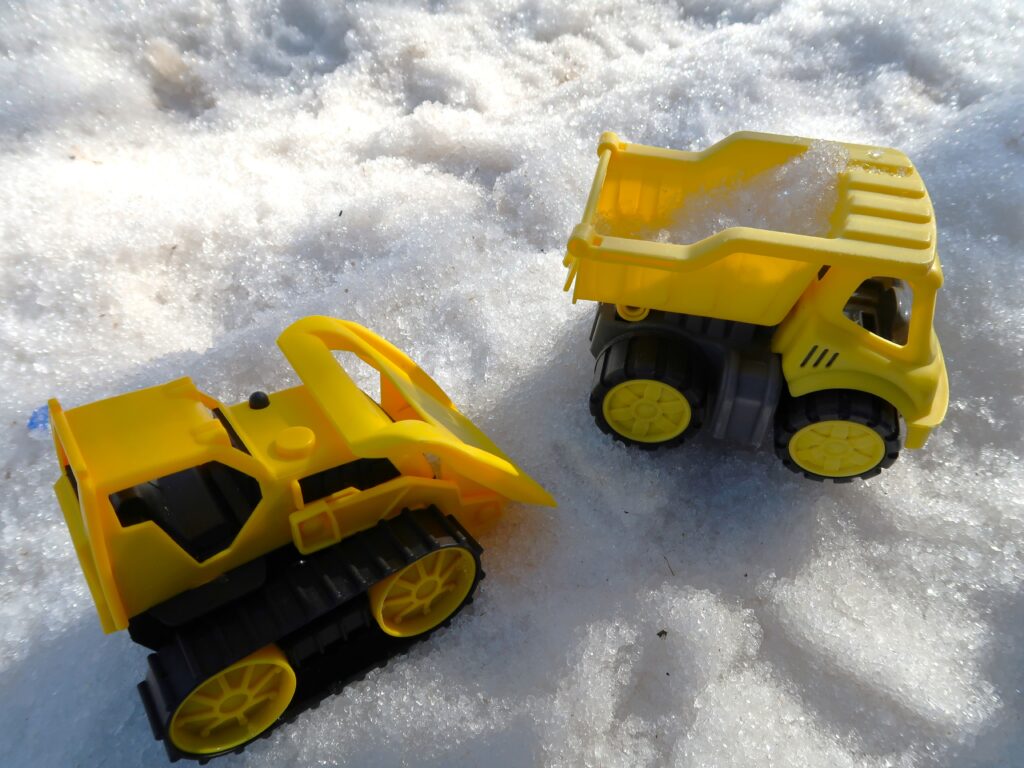 Taking snow toys to play is a great way to keep kids entertained