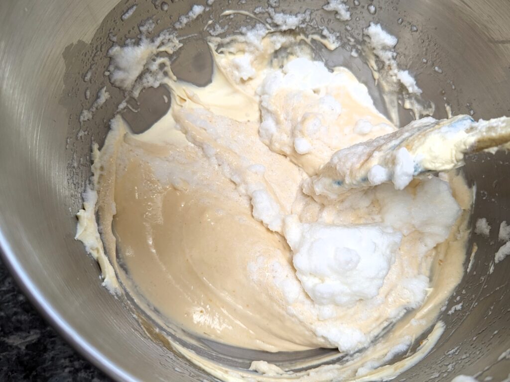 folding egg whites to tiramisu cream